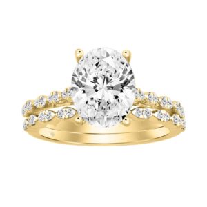 14K YELLOW GOLD 3 1/3CT ROUND/OVAL DIAMOND LADIES BRIDAL SET (CENTER STONE OVAL DIAMOND 3CT)